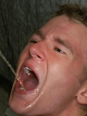 Cole Brooks gets piss in the mouth by Girth Brooks and licks his cum off the dirty floor.