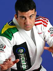 Brazilian jiu-jitsu champion Carlos Machado jerking his hard cock on video!