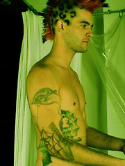 Punk With Mohawk and Tats Rubs in the Tub