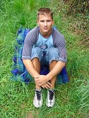 Cute blond jock jerking off outdoors