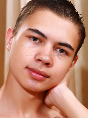 Lovely twink gets naked