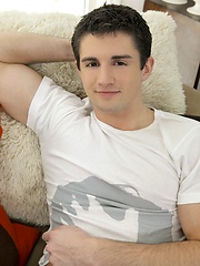 Scott Woodman's hairy legs and arms nicely offset the smoothness of his athletic chest.  His works his hard dripping cock and tight little hole j