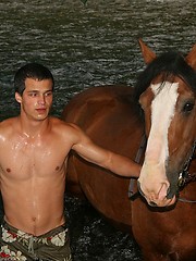 Young sexy jock posing naked outdoors