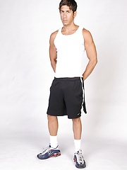 Good-looking gay hunk Jack Spade shows off his athletic body & tattoos