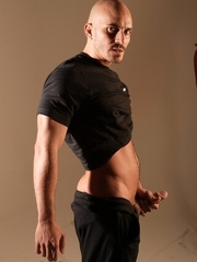 Bald hottie shows his uncut dick