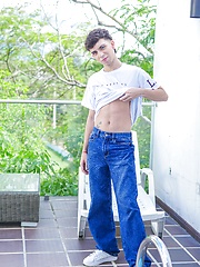 Skinny latino Liam Zuares playing with his uncut dick