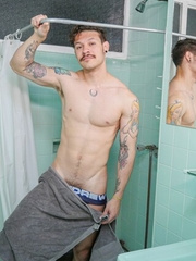 Andy Stevens in a shower