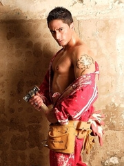 Construction worker playing with a dildo