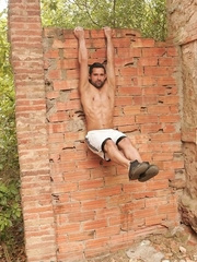 Dark-haire hunkl Billy Baval shows his sexy ripped body and pissing